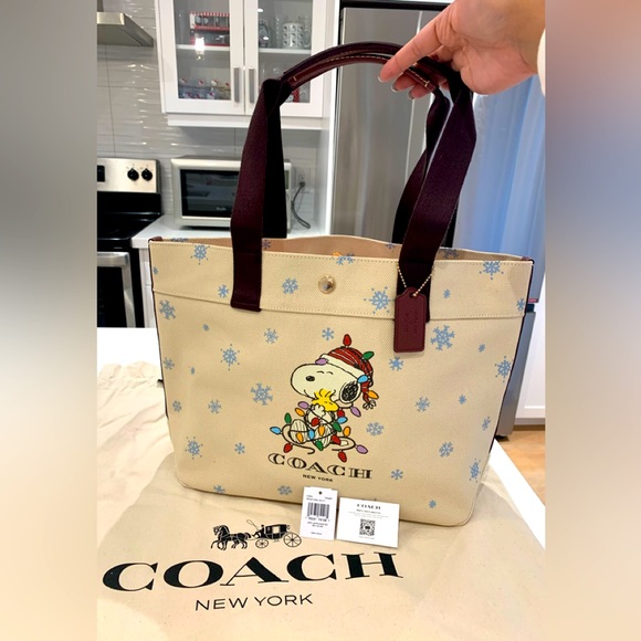 Coach Handbags - SOLD 🔥 New with Tags Coach x Peanuts Snoppy Tote Purse 🔥